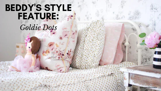 
      An infographic with a twin bed made with gold dotted zipper bedding and pink floral accessories.
    