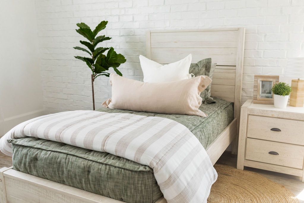 An infographic detailing the product of the month for June is Remington Luxe with the zipper bedding showcased.